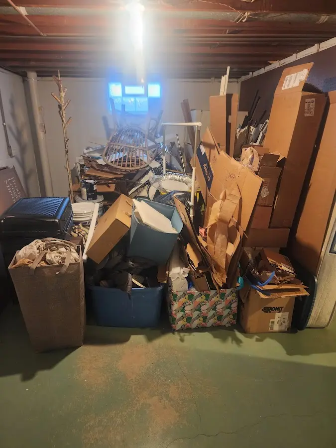 Roll-off dumpster container at job site for Yard Waste Dumpster Rental in West Des Moines